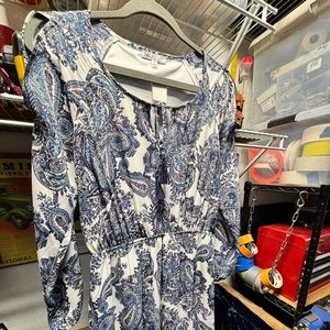 Long sleeve dress with peek a boo sleeves. Worn once. Size Small Petite.